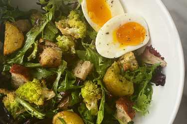 Potato, romanesco, and zhoug dressing breakfast salad