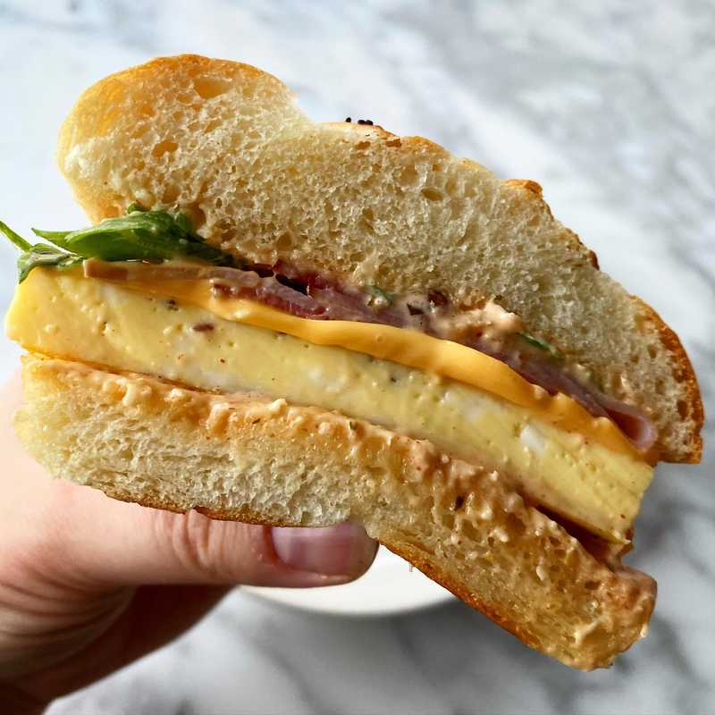 Breakfast sandwich at home! Homemade Kaiser rolls with the egg “soufflé” technique (it’s not too hard! eggs and water! Baked low and slow in a bain-marie…