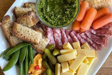 Cheese board with ramp pesto