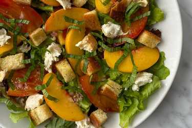 Peach, tomato, and smoked mozzarella salad