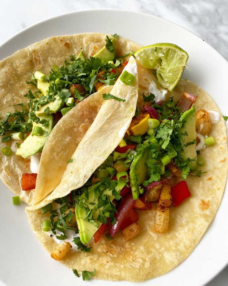 Clean out roasted veggie tacos. Some sweet potato, turnip, parsnip, delicata squash, red pepper, and red onion diced and roasted at ~450 for about 4…