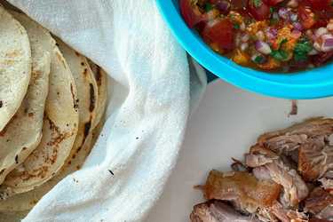 Pork belly tacos with apricot salsa