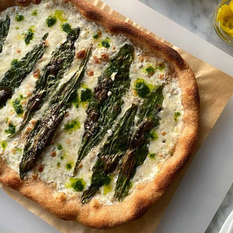 more ramp adventures tonight in pizza form: béchamel with ramps and ramp oil (the winner) and ramp pesto/fennel (very good). whole wheat sourdough pizza…