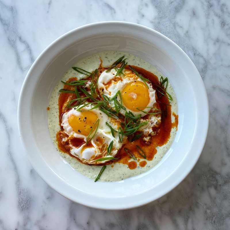 Çılbır-ish breakfast with leftover blended tzatziki, chili oil and some crispy eggs. Toasty bread not pictured.