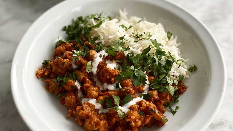 photo of completed recipe: Butter chicken is traditionally made with a cashew based sauce that simmers for hours. I used Zaynab Issa’s technique to speed up the sauce with heavy…